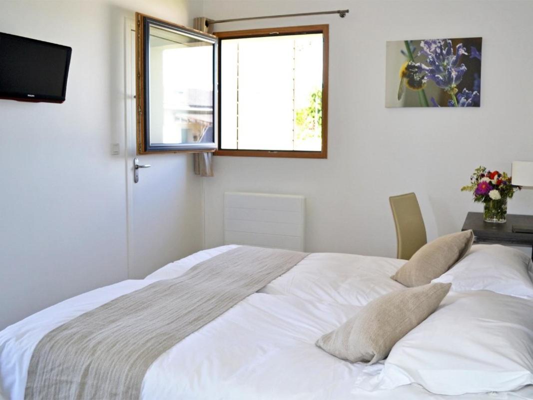 Gites & Tiny Houses Les Hauts De Toulvern Baden Quarto foto